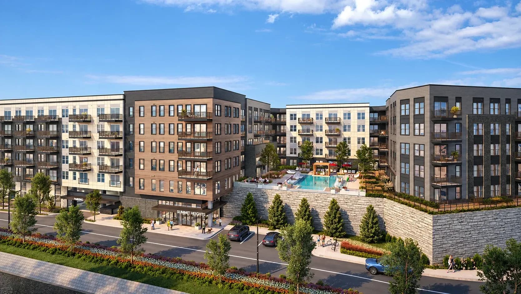 Modern residential complex with courtyard pool, landscaping, and multi-story apartment buildings